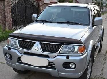 Дефлектор капота (мухобойка) Mitsubishi Pajero Sport 2000-2008 (Митсубиши Паджеро Спорт) ТМ SIM