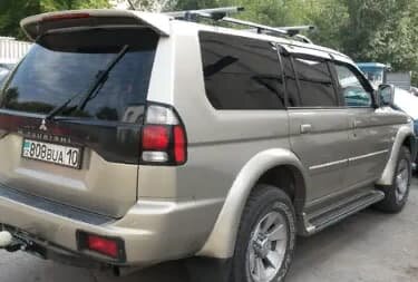 Дефлекторы окон (ветровики) Mitsubishi Pajero Sport 1998-2007/Challenger 1999-2008 (Митсубиши Паджеро) ТМ Кобра Тюнинг